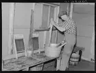 Photo:Lumberjack washing clothes. Camp near Effie, Minnesota
