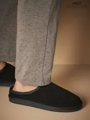 Black Faux Fur Lined Signature Suede Mule Slippers (642858) | $55