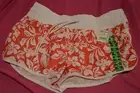 ladies board shorts nwt from k-mart size S colour orange/white