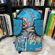 SPRAYGROUND JEAN MICHEL BASQUIAT FALLEN ANGEL WINGS BACKPACK / BOOK BAG