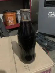 Vintage Sealed Embossed Coca Cola Bottle