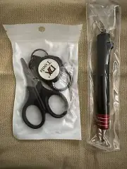A Set Of Fish Line Cutter And Hooks Remover