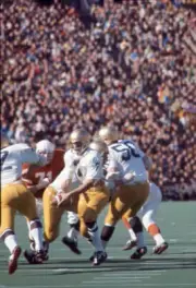 Notre Dame QB Joe Theismann in action drops back to pass vs Texas - Old Photo