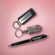 Set of Two Key Chains & Ball Point Pen with the name Rudolph Printed in them NIB