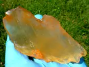 Libyan Desert Glass Meteorite Tektite impact specimen( 370 crt)Pearl orange Tool