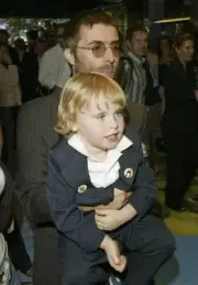 Liam Gallagher and son Gene Appleton Gallagher arrive at the UK C- 2004 Photo 3