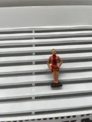 F1043 - Greenhills Scalextric Carrera Seated Female Spectator 1.32 Scale Hand Pa