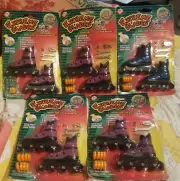 5 UNOPENED WOB EXTREME BLADES FINGER ROLLER BLADES. 4 PURPLE AND 1 BLUE