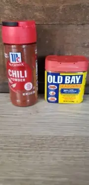 Two spices: McCormick Chili Powder 2.5 oz and OLD BAY Seasoning 2 oz.