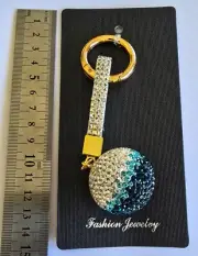 Cute blue and silver globe keychain. diamond encrusted look, premium feel.