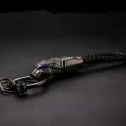 Black Luxury Panthera Blue diamond eye PU leather rope car keychain keyring (for: Peugeot)