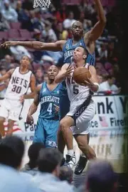 New Jersey Nets Jason Kidd vs Charlotte Hornets Elden Campbell dur- Old Photo