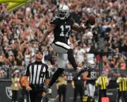 Davante Adams Touchdown Jump Spike Las Vegas Raiders 8x10 NFL Football Photo
