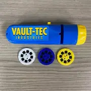 1 NOVELTY VAULT -TEC TORCH PROJECTOR WITH 3 SLIDE-DISCS FALLOUT VAULT 33