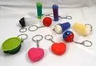 NEW TUPPERWARE KEYCHAINS LOT 2 (heart, flashlight, quick shake, shape o),