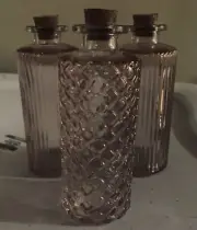 Set Of 3 Corked Pink Glass Bottles