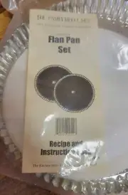 Pampered Chef flan pan set- new in package 2 10 inch pans plus instructions
