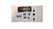9 piece set of Atari 7800 port & switch dust covers black Made in the USA.