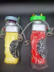 Pair of fun battery operated spinning a light up toys