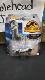 NIB 2021 VELOCIRAPTOR BLUE JURASSIC WORLD 1/64 HOT WHEELS CHARACTER CARS 3/6 TOY