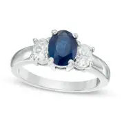 Oval Blue Sapphire and 0.63 CT. T.W. Oval Natural Diamond Three Stone Ring in Solid 14K White Gold