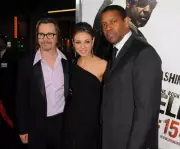 Actors Gary Oldman, Mila Kunis Denzel Washington arrive at "The Bo- Old Photo 4