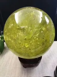 在飛比找Yahoo!奇摩拍賣優惠-幸運星天然水晶  天然巴西黃水晶球23.5cm 紫晶綠千層幽