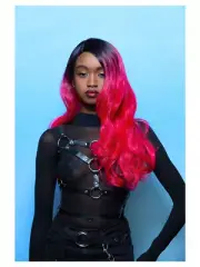 Manic Panic Red Curls with Dark Roots and Side Part