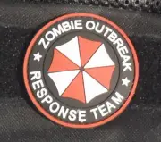 UMBRELLA CORP ZOMBIE OUTBREAK PVC PATCH - CUT & LOOP BACKING -NEW MADE ROUND 6cm