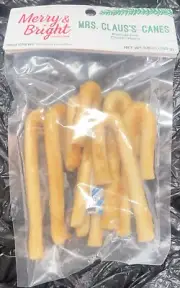 Merry & Bright Dog Chew Rawhide Free Chicken Flavor. Mrs Claus’s Canes