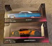 Jada Toys 2023 "Pink Slips" Blue 1963 Cadillac & Lamborghini Aventador 1:24