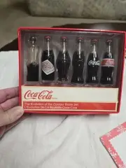 Coca Cola Evolution Of The Contour Bottle Set