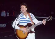 Singer Cliff Richard performing during his Pro Celebrity Charity - Old Photo