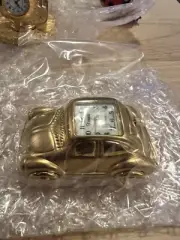 Xanadu Mini Gold Punch buggy Desk Clock Collectable New And Working.