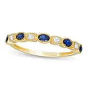 Oval Blue Sapphire and 0.10 CT. T.W. Princess-Cut Natural Diamond Four Stone Art Deco Stackable Ring in Solid 10K Yellow Gold