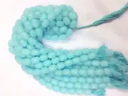 13 inch strand of natural Aqua Chalcedony Tube Smooth 8-12mm beads.