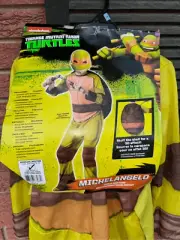 Teenage mutant ninja Turtles. Michelangelo size medium. Brand new in plastic