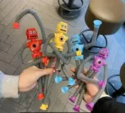 Stretchable 4-Pack FlexiFun Robot Toy Set - Durable Plastic, Suction Cup Hands,