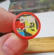plastic 1960s dime store vending machine toy Flicker Ring, Cowboy at window, red