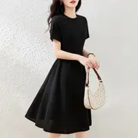 在飛比找ETMall東森購物網優惠-黑色春夏季顯瘦氣質a字中長裙