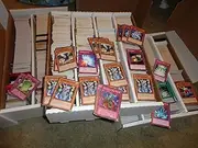 YuGiOh SUPER Mega Lot 100 Mint Card Plus 4 Rares PLUS Holo Card. Alternative Foil Promo Included