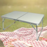 在飛比找momo購物網優惠-【露營達人】輕巧摺疊桌(/鋁合金休閒桌/野餐桌/露營桌/攜帶