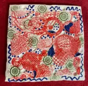 Handmade Ceramic Tile Trivet with Gadget Print Design Red Whiite Blue Green