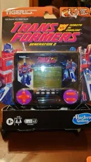 Tiger Electronics: THE TRANSFORMERS GENERATION 2 LCD Handheld Video Game NEW