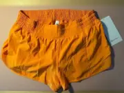 LULULEMON Hotty Hot HR Short 2.5 Lined Size 10 ORANGE