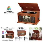 Nostalgic 6-in-1 Bluetooth Record Player & Multimedia Center with Built-in Sp...