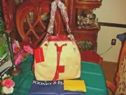 NWT Dooney & Bourke AnniversarySignature Collection Drawstring Bag TAN/Red color