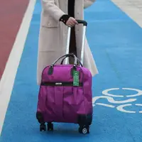 在飛比找樂天市場購物網優惠-旅行包拉桿包女手提韓版短途大容量行李袋飛機輪軟箱男輕便潮簡約