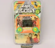 1992 Tiger Clay Land of the Lost Handheld Electronic LCD Game New Fact. Sealed!