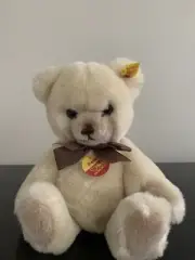 STEIFF "PETSY" jointed cream teddy bear with brown bow BOTH EAR AND CHEST TAGS